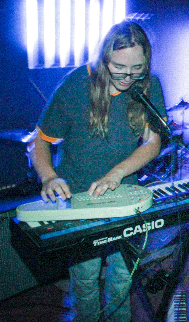 Lucy playing the omnichord @ Gilmore Music, Long Beach on 24 June 2023